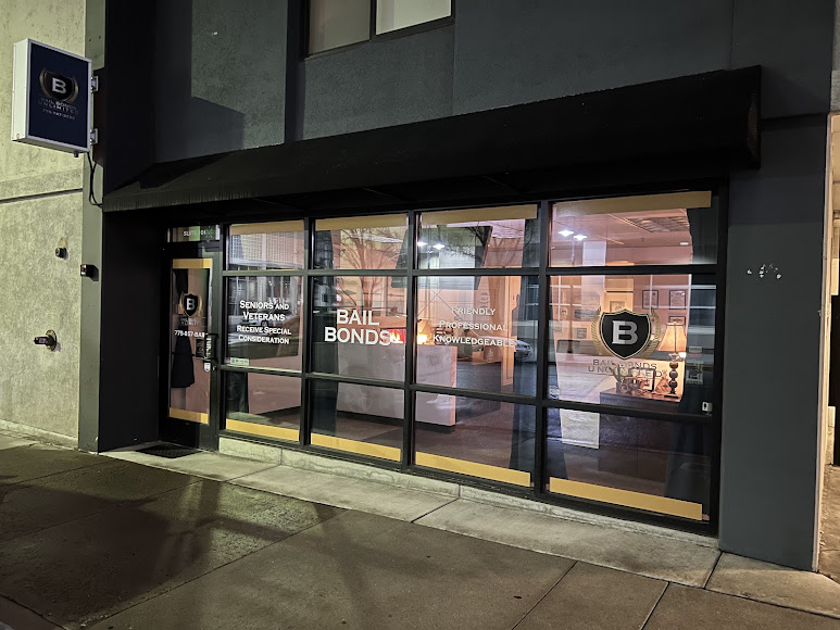 Bail Bonds Unlimited storefront in Reno, with shield logos on the windows